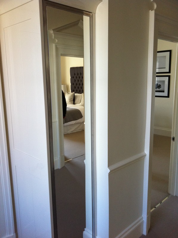 Full-length wardrobe mirror fitted in Kensal Green home